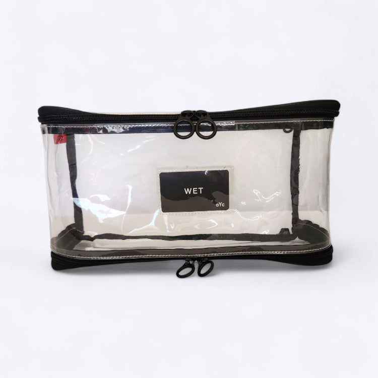 OUT YNDR CLUB Medley baby bag wet clothes and swim pod with zipper top and bottom, front view empty, baby bag compartment