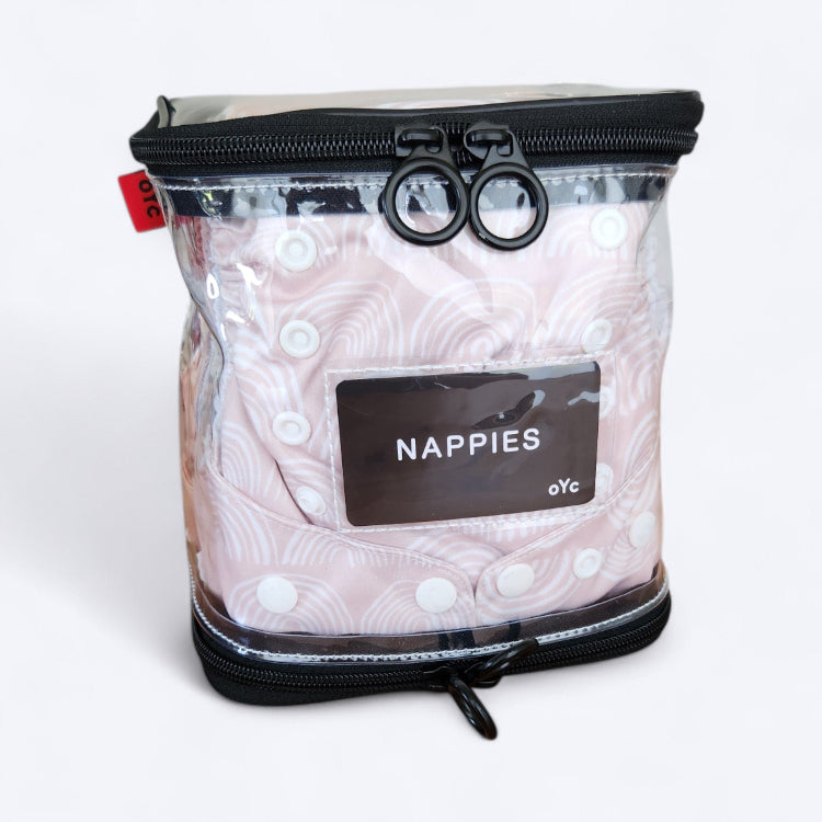 OUT YNDR CLUB wet clothes pod with zipper top and bottom, front view packed with four modern cloth nappies