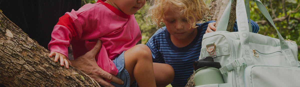 Family outdoors with the Medley nappy backpack