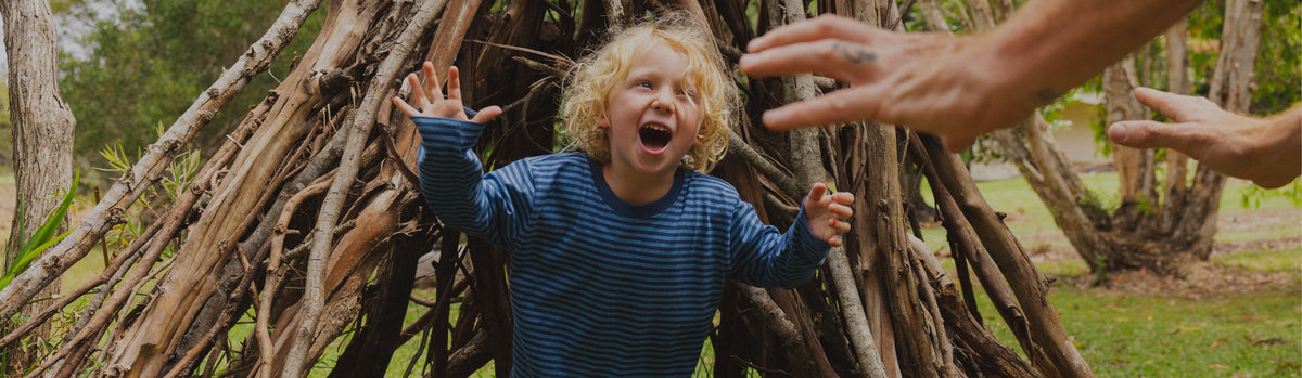 Family outdoors with the Medley nappy backpack