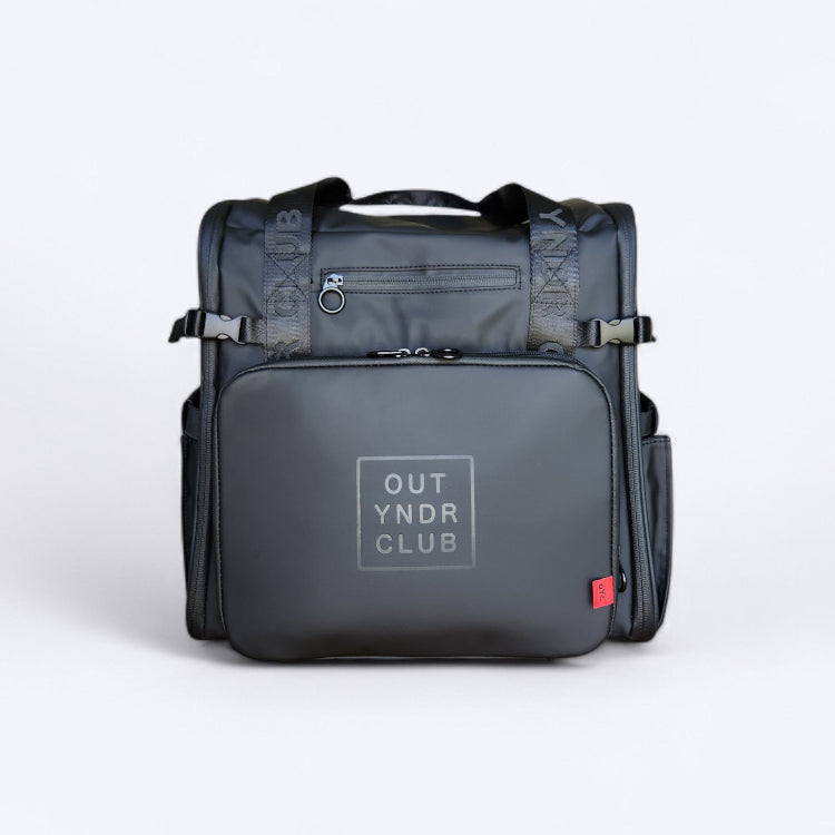 OUT YNDR CLUB Medley baby bag for parents with newborn baby and multiple children, black front view