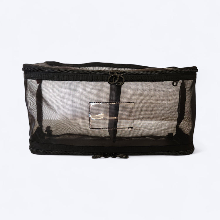 OUT YNDR CLUB mesh clothes pod with zipper top and bottom, front view empty, baby bag compartment with divider
