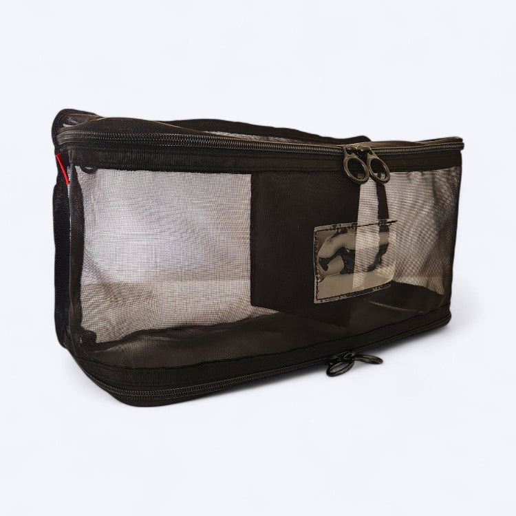 OUT YNDR CLUB mesh clothes pod with zipper top and bottom, front angle view empty, baby bag compartment pockets
